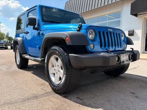 Photos of 2015 Jeep Wrangler Sport SUV 2D for sale in Fremont, NE at Tailgate Motor Co. (Fremont North)