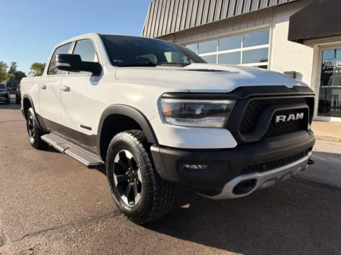 Photos of 2022 Ram 1500 Crew Cab Rebel Pickup 4D 5 1/2 ft for sale in Fremont, NE at Tailgate Motor Co. (Fremont North)