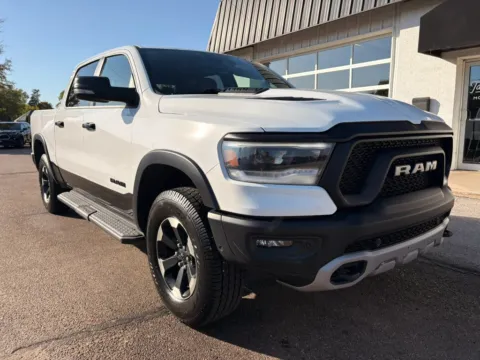 Photos of 2023 Ram 1500 Crew Cab Rebel Pickup 4D 5 1/2 ft for sale in Fremont, NE at Tailgate Motor Co. (Fremont North)