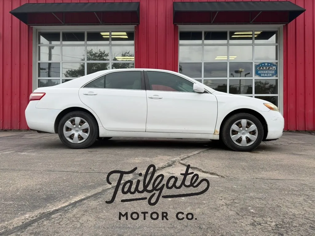 White 2009 Toyota Camry LE Sedan 4D for sale in Fremont, NE
