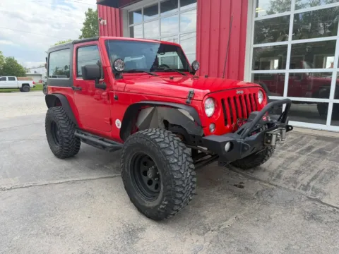 Photos of 2015 Jeep Wrangler Sport SUV 2D for sale in Fremont, NE at Tailgate Motor Co. (Fremont South)