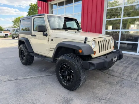 Photos of 2011 Jeep Wrangler Sport SUV 2D for sale in Fremont, NE at Tailgate Motor Co. (Fremont South)