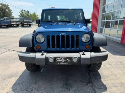 Another view of 2010 Jeep Wrangler Unlimited Sport SUV 4D for sale in Fremont, NE at Tailgate Motor Co. (Fremont South)