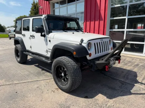 Photos of 2012 Jeep Wrangler Unlimited Sport SUV 4D for sale in Fremont, NE at Tailgate Motor Co. (Fremont South)