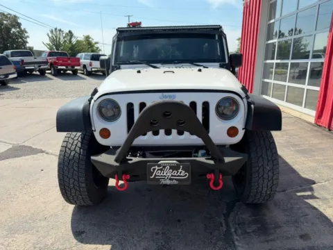 Another view of 2012 Jeep Wrangler Unlimited Sport SUV 4D for sale in Fremont, NE at Tailgate Motor Co. (Fremont South)