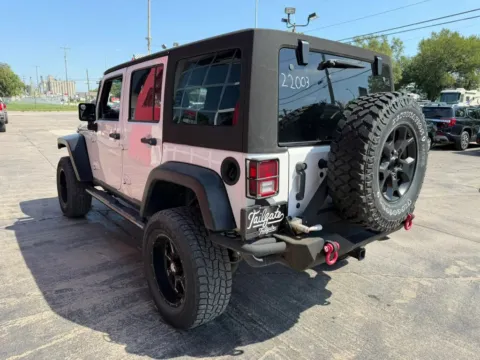 More photos of 2012 Jeep Wrangler Unlimited Sport SUV 4D at Tailgate Motor Co. (Fremont South), NE