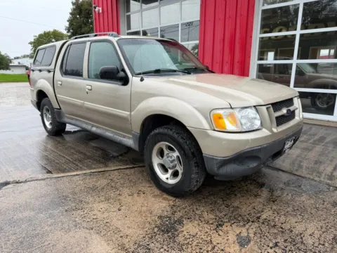 Photos of 2004 Ford Explorer Sport Trac XLT Sport Utility Pickup 4D for sale in Fremont, NE at Tailgate Motor Co. (Fremont South)