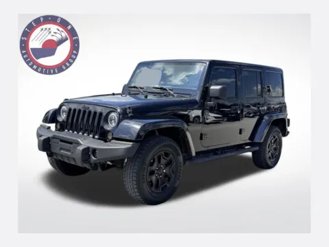Black 2016 Jeep Wrangler Unlimited Sahara for sale in Pensacola, FL