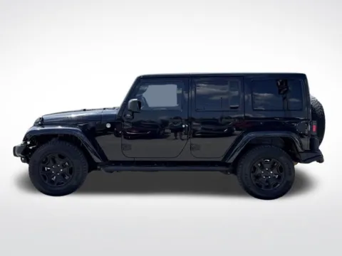 Another view of 2016 Jeep Wrangler Unlimited Sahara for sale in Pensacola, FL at Step One Motorsports