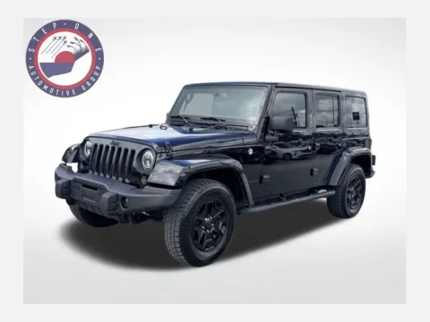 Black 2016 Jeep Wrangler Unlimited Sahara for sale in Pensacola, FL