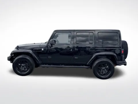 Another view of 2016 Jeep Wrangler Unlimited Sahara for sale in Pensacola, FL at Step One Motorsports