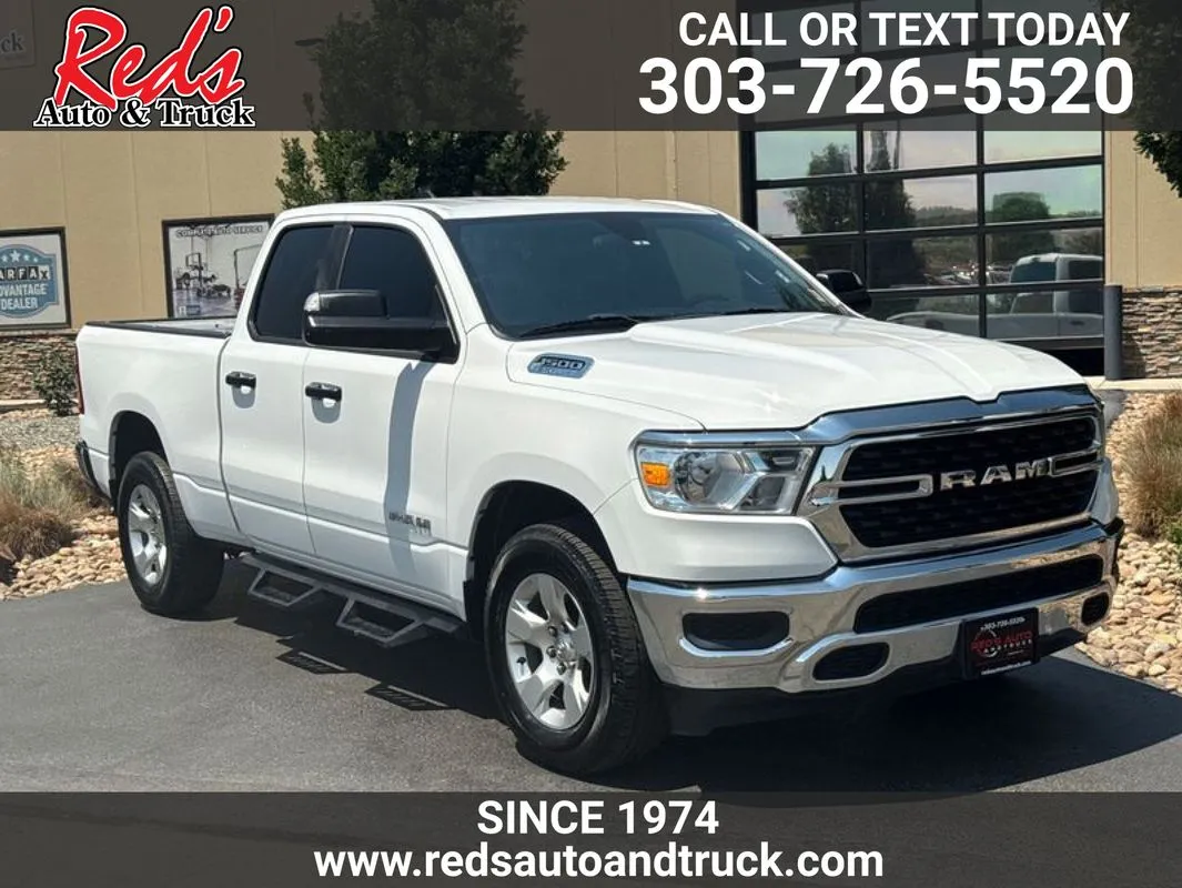 White 2023 Ram 1500 Big Horn Quad Cab 4x4 6'4" Box for sale in Longmont, CO