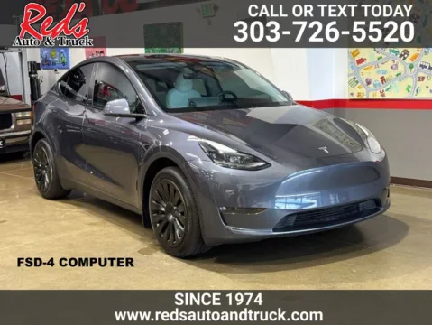 Silver 2023 Tesla Model Y Long Range Dual Motor All-Wheel Drive for sale in Longmont, CO