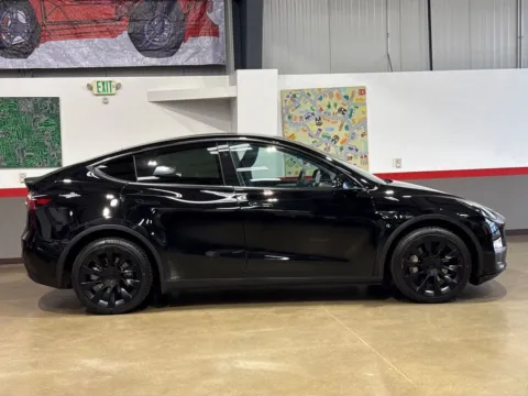 Another view of 2023 Tesla Model Y Long Range Dual Motor All-Wheel Drive for sale in Longmont, CO at Red's Auto & Truck