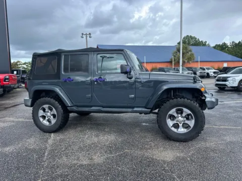 Photos of 2016 Jeep Wrangler Unlimited Sahara for sale in Myrtle Beach, SC at Bob Mills Mitsubishi-Myrtle Beach