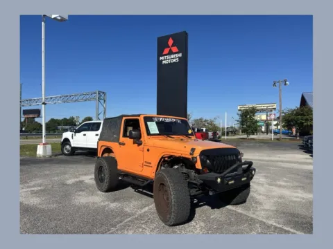 Orange 2012 Jeep Wrangler Sport for sale in Myrtle Beach, SC
