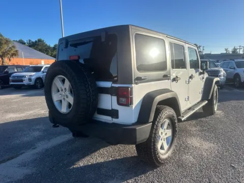 Another view of 2013 Jeep Wrangler Unlimited Sport for sale in Myrtle Beach, SC at Bob Mills Mitsubishi-Myrtle Beach