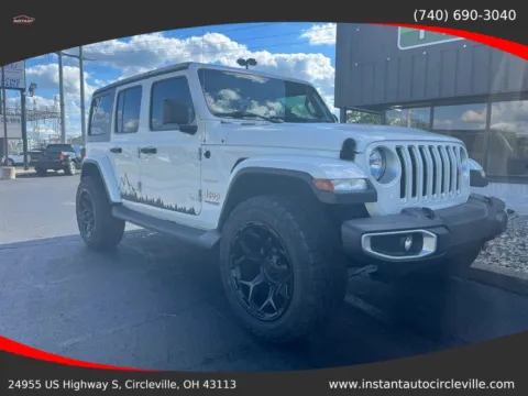 Another view of 2019 Jeep Wrangler Unlimited Sahara Sport Utility 4D for sale in Circleville, OH at Instant Auto Sales Circleville