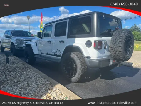 Photos of 2019 Jeep Wrangler Unlimited Sahara Sport Utility 4D for sale in Circleville, OH at Instant Auto Sales Circleville