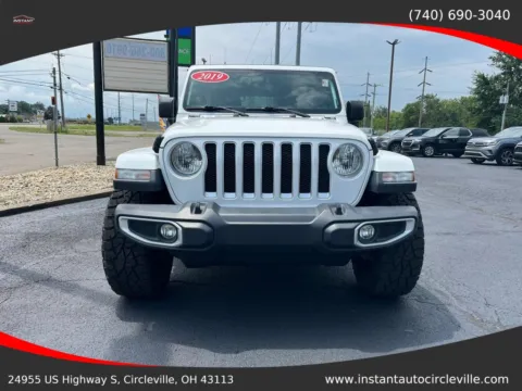 Photos of 2019 Jeep Wrangler Unlimited Sahara Sport Utility 4D for sale in Circleville, OH at Instant Auto Sales Circleville