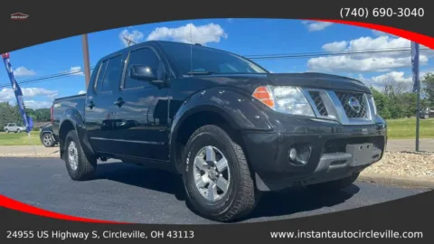 Photos of 2013 Nissan Frontier Crew Cab PRO-4X Pickup 4D 5 ft for sale in Circleville, OH at Instant Auto Sales Circleville
