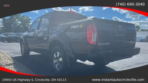 Another view of 2013 Nissan Frontier Crew Cab PRO-4X Pickup 4D 5 ft for sale in Circleville, OH at Instant Auto Sales Circleville