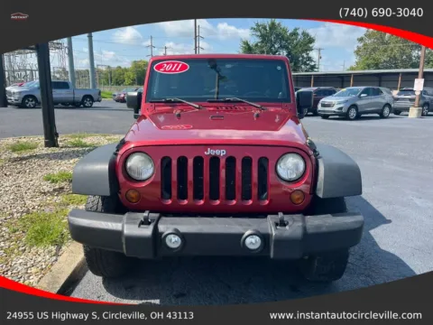 Photos of 2011 Jeep Wrangler Unlimited Sport SUV 4D for sale in Circleville, OH at Instant Auto Sales Circleville