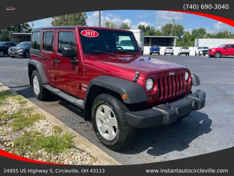 Another view of 2011 Jeep Wrangler Unlimited Sport SUV 4D for sale in Circleville, OH at Instant Auto Sales Circleville