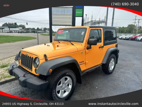 Orange 2012 Jeep Wrangler Sport SUV 2D for sale in Circleville, OH