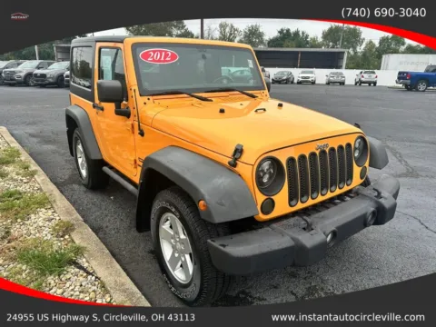 Another view of 2012 Jeep Wrangler Sport SUV 2D for sale in Circleville, OH at Instant Auto Sales Circleville