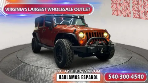 Orange 2009 Jeep Wrangler Unlimited Rubicon for sale in Fredericksburg, VA