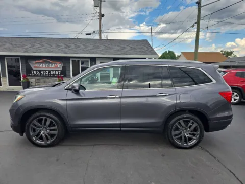 Photos of 2016 HONDA PILOT TOURING for sale in Kokomo, IN at Fast Lane Autos