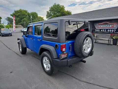 Another view of 2015 JEEP WRANGLER UNLIMI SPORT for sale in Kokomo, IN at Fast Lane Autos