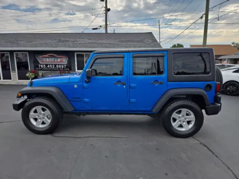 Photos of 2015 JEEP WRANGLER UNLIMI SPORT for sale in Kokomo, IN at Fast Lane Autos