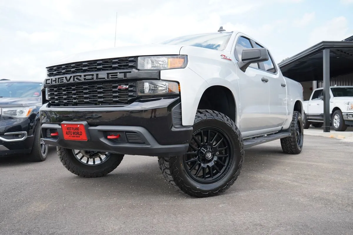 Silver 2021 Chevrolet Silverado 1500 4WD Crew Cab Short Bed Custom Trail Boss for sale in West Plains, MO
