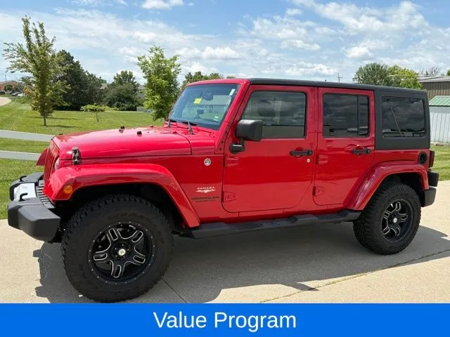Red 2013 Jeep Wrangler Unlimited Sahara for sale in Maryville, MO