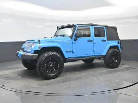 Photos of 2018 Jeep Wrangler JK Unlimited Sahara for sale in Darlington, SC at Bob Mills Chevrolet