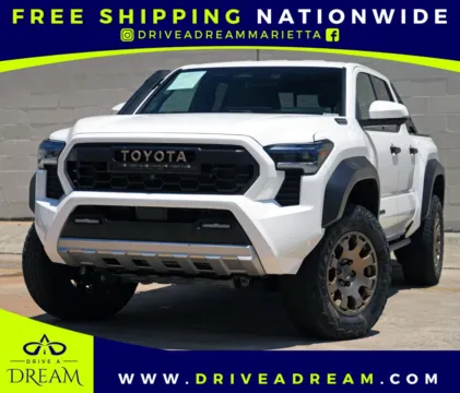 White 2024 Toyota Tacoma Trailhunter Hybrid for sale in Marietta, GA
