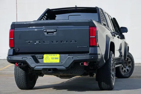 More photos of 2025 Toyota Tacoma Trailhunter Hybrid at DRIVE A DREAM, GA