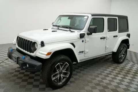 Photos of 2024 Jeep Wrangler Sport S 4xe for sale in Des Plaines, IL at Jidd Motors Mitsubishi