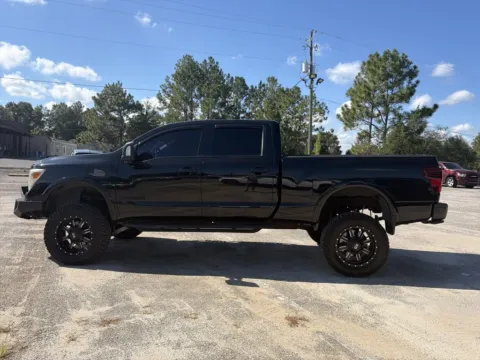 Another view of 2017 Nissan Titan XD PRO-4X for sale in Crestview, FL at Step One Chrysler Dodge Jeep Ram Fiat Crestview