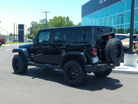 More photos of 2014 Jeep Wrangler Unlimited Sahara at Step One Kia Fort Walton Beach, FL