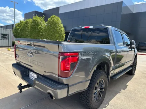 Photos of 2024 Ford F-150 XLT Lifted, High Eqp Pkg, Black App Pkg for sale in Tomball, TX at Fred Haas Nissan
