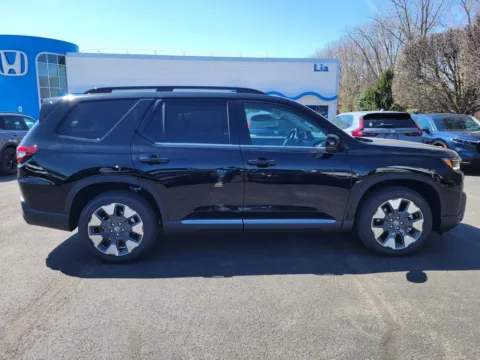 Photos of 2026 Honda Pilot Touring for sale in Buffalo, NY at Lia Honda Williamsville