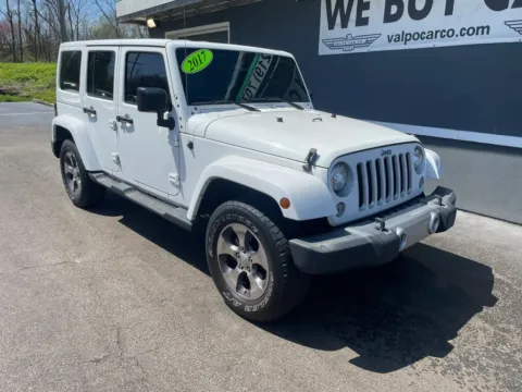 Photos of 2017 Jeep Wrangler Unlimited Sahara Sport Utility 4D for sale in Valparaiso, IN at Valpo Car Co.