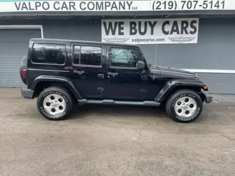 Black 2014 Jeep Wrangler Unlimited Sahara Sport Utility 4D for sale in Valparaiso, IN
