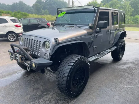 More photos of 2014 Jeep Wrangler Unlimited Sport SUV 4D at Valpo Car Co., IN