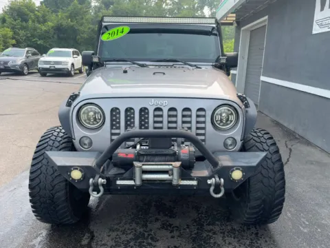 More photos of 2014 Jeep Wrangler Unlimited Sport SUV 4D at Valpo Car Co., IN