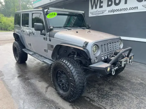 Photos of 2014 Jeep Wrangler Unlimited Sport SUV 4D for sale in Valparaiso, IN at Valpo Car Co.