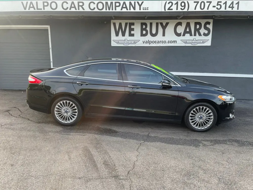 Black 2016 Ford Fusion Titanium Sedan 4D for sale in Valparaiso, IN